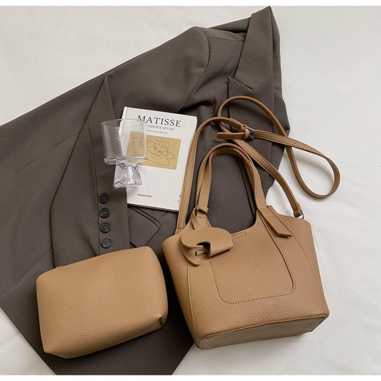 Премиальная портативная сумка-ведро в иностранном стиле женская 2025 новая модная универсальная сумка через плечо простая дорожная сумка-мессенджер