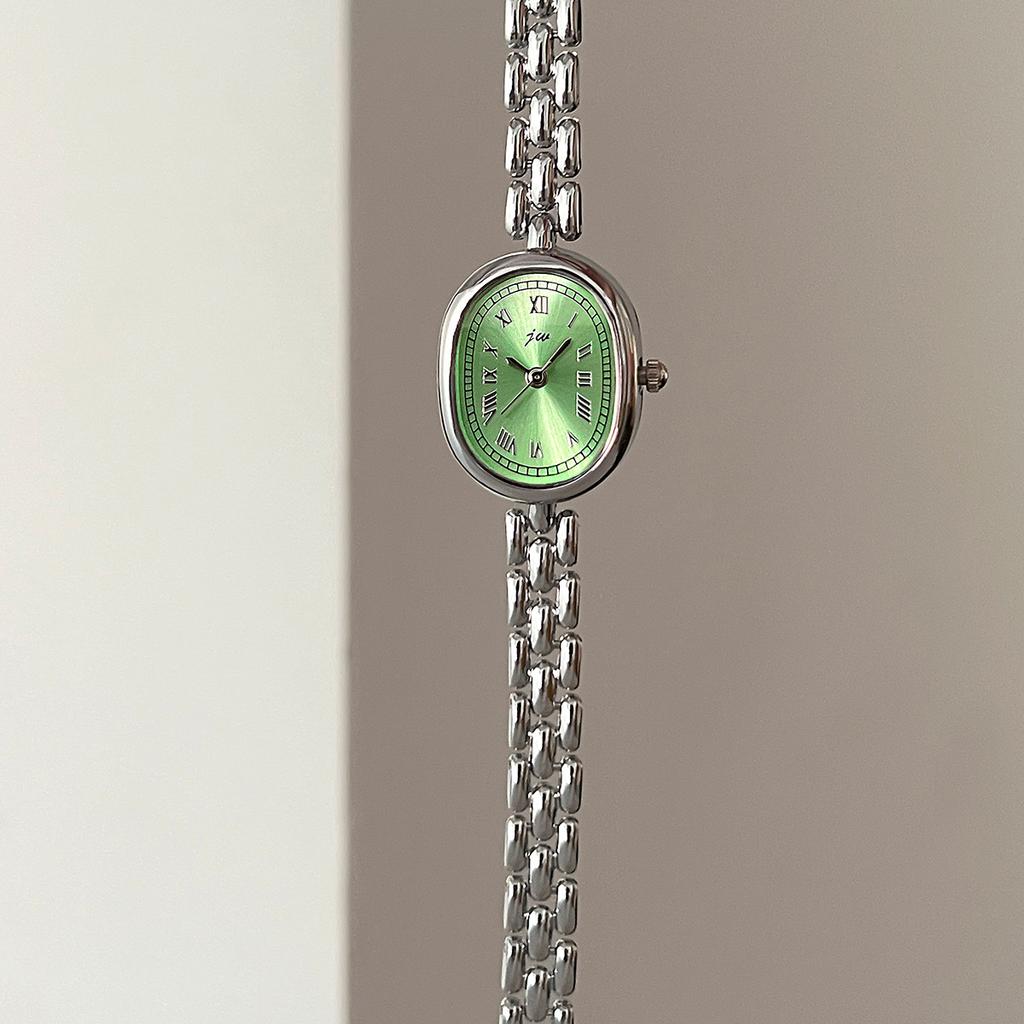 Authentic Jingwei Oval Vintage Women's Quartz Watch with Retro Roman Alloy Bracelet