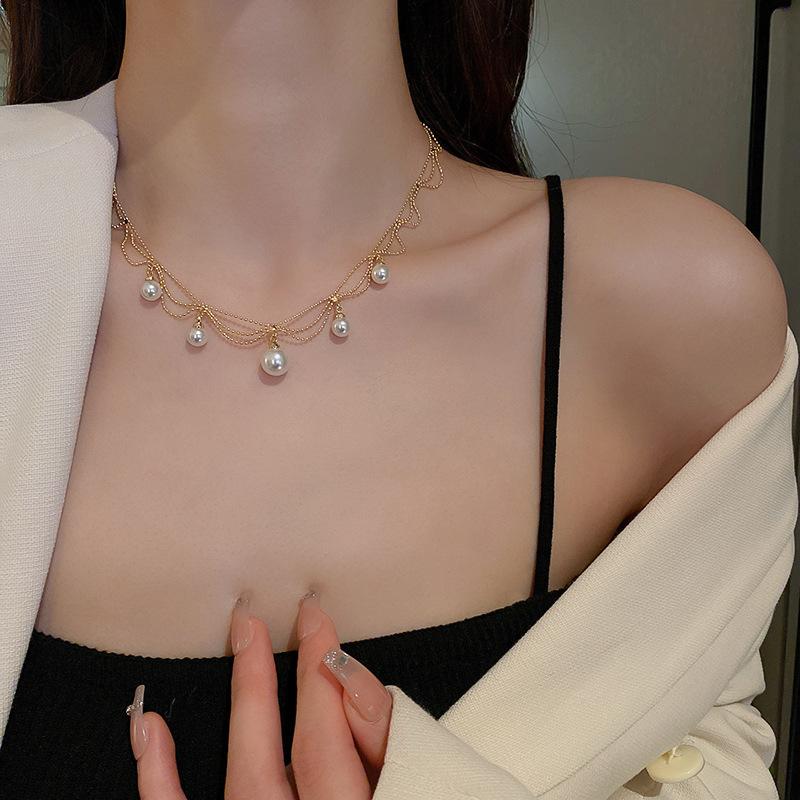Korean temperament love butterfly pearl fringed necklace fashion collarbone chain versatile item decoration