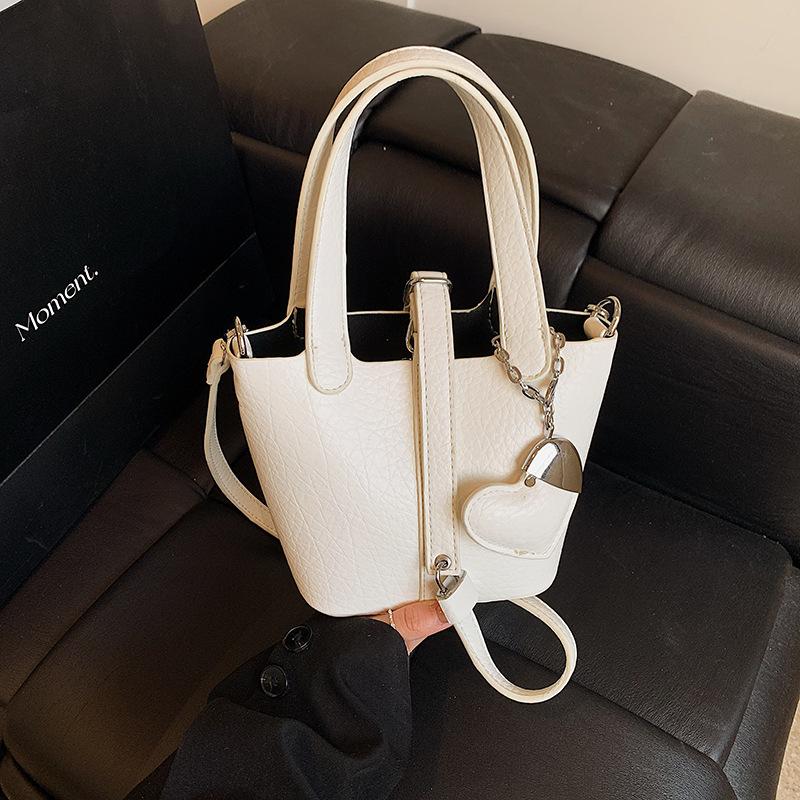 Весна 2025 новая простая сумка-тоут с узором личи, женская модная универсальная сумка-мессенджер в стиле ведро