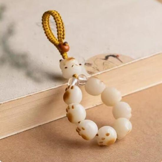 Qiong Rui Charcoal-Burned Fortune Cat Paw Phone Strap Bodhi seed soft-touch ornament paired with car key chain