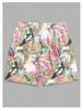 Summer 2025 3D-printed men's resort shorts with palm trees and exotic flowers