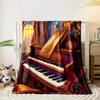 Intricate golden swirls decorate a vibrant piano in a glowing, floral room. for all seasons blanket lunch break throw gift