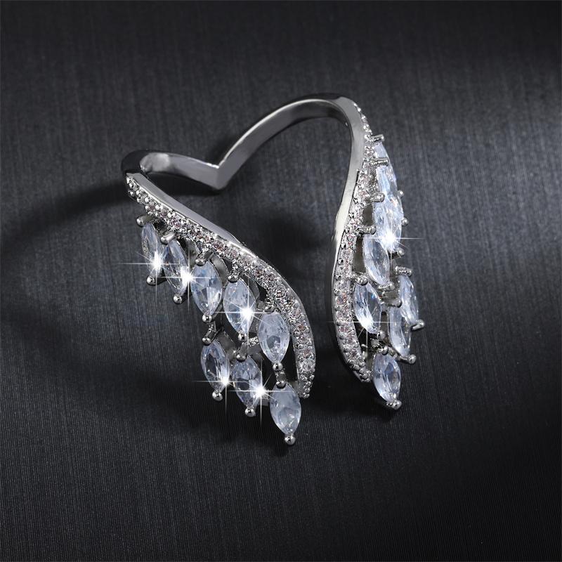 ZAKOL Fashion White Zirconia Leaf Open Rings for Girl Trendy Crystal Wing Finger Adjust Ring Party Women Jewelry