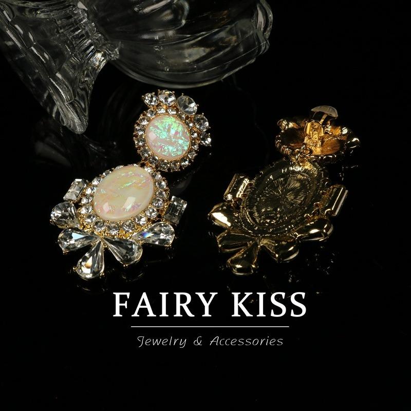 Тяжелая промышленность Атмосферные инкрустированные стразами Меняющие цвет Высококлассные Розовые Темпераментные Женские Серьги