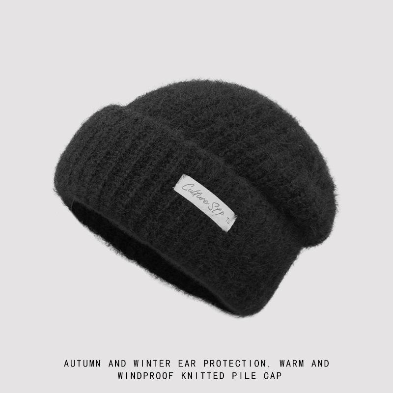Winter simple and fashionable hat women's outdoor warm thickened headgear fashionable small knitted wool hat