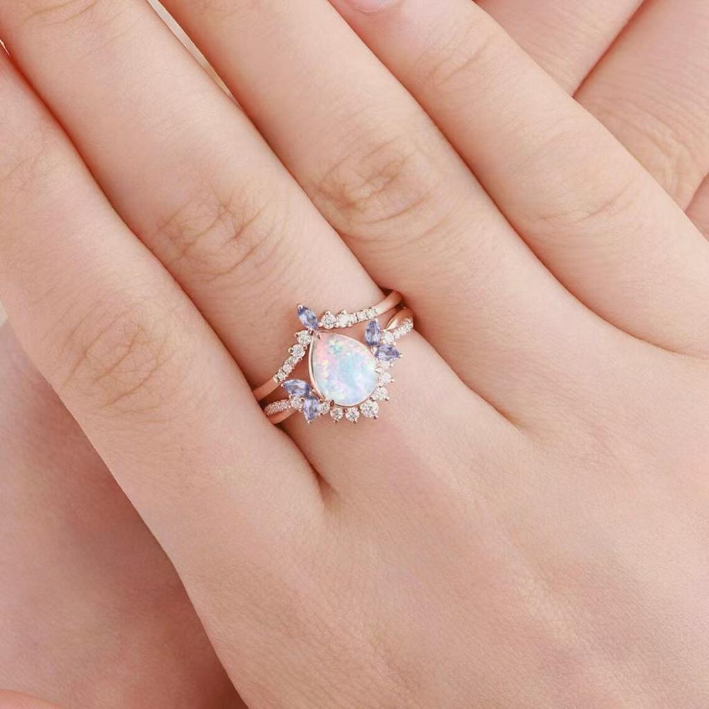 New European and American rose gold pair of rings with water drop opal stones Bow-shaped couple rings for women