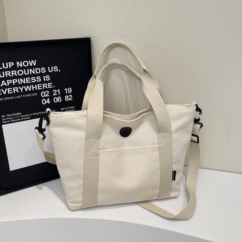 Большая вместительная тисненая сумка-тоут с буквами 2025 новая корейская версия маминой сумочки универсальная однотонная сумка через плечо модная