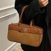 Портативная женская сумка-бостон 2025 новая нишевая сумка под мышку высокого класса модная ретро-сумка для通勤 на плечо/кроссбоди