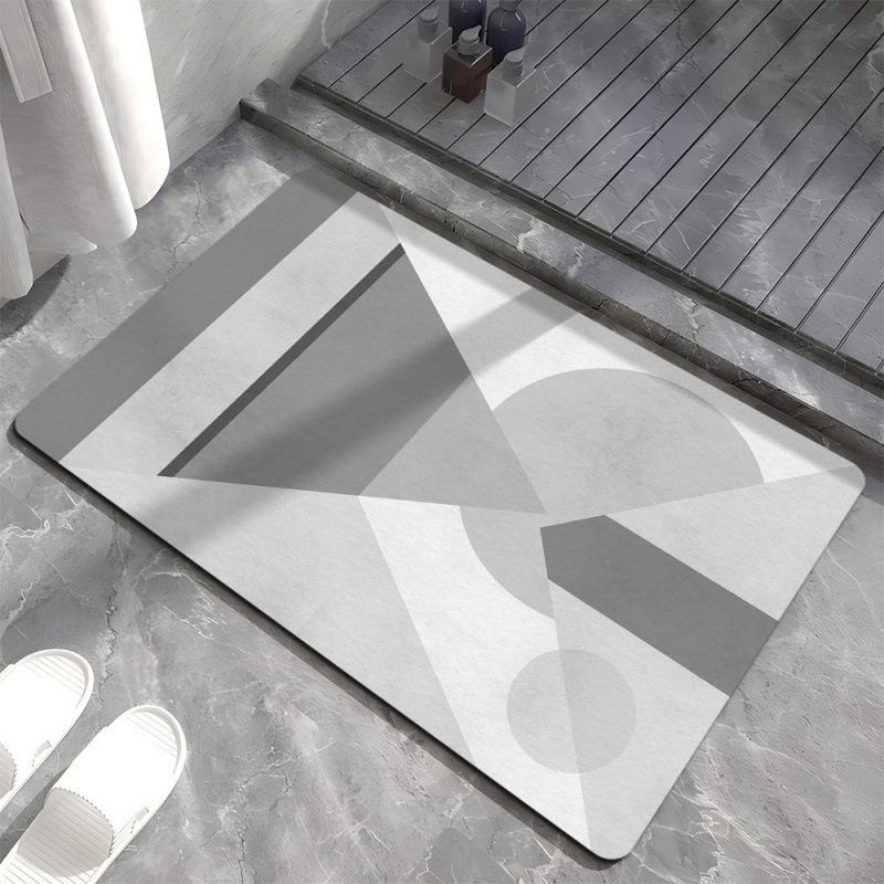 Коврик для ванной комнаты с геометрическим узором серого цвета — нескользящий, устойчивый к грязи и износу, простой в уходе. Идеально подходит для входов в скандинавском стиле.