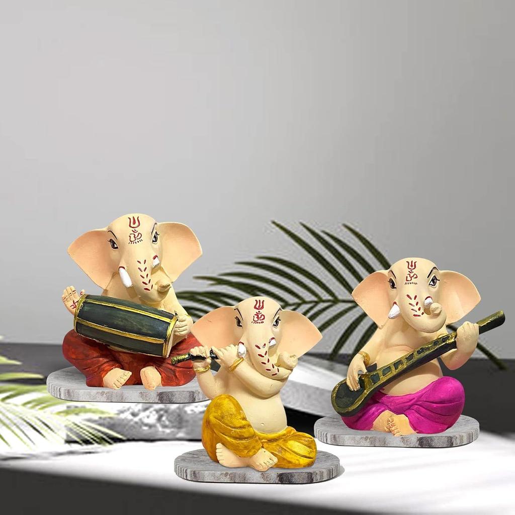 Сидящий Ганеша с музыкальными инструментами Декоративная статуэтка для домашнего декора - (Набор из 3 предметов, разноцветный)