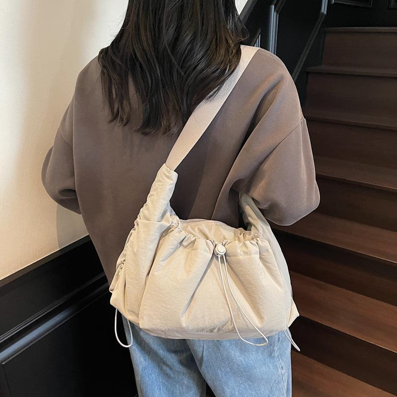 Korean fashion cotton clothes messenger bag 2026 new drawstring shoulder bag versatile simple cloud puff bag women