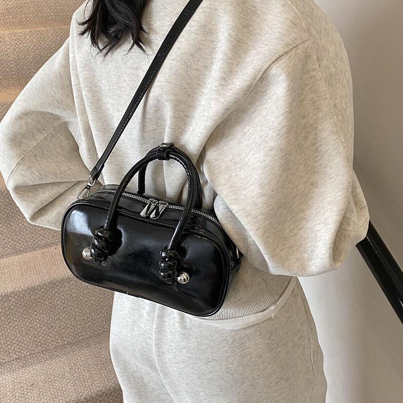 Сумка-бостон в высоком стиле, женская модная нишевая модель 2025, новая весенне-летняя сумка-мессенджер, портативная сумка для боулинга