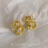Light luxury temperament, flower ear clips, niche high-end sense, exquisite zircon metal stud earrings, mosquito coil disc, women's earless earrings.
