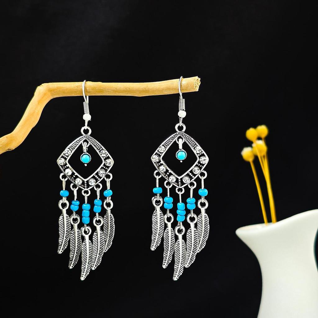 European and American Retro Hollow Turquoise Tassel Bohemian Earrings for Women