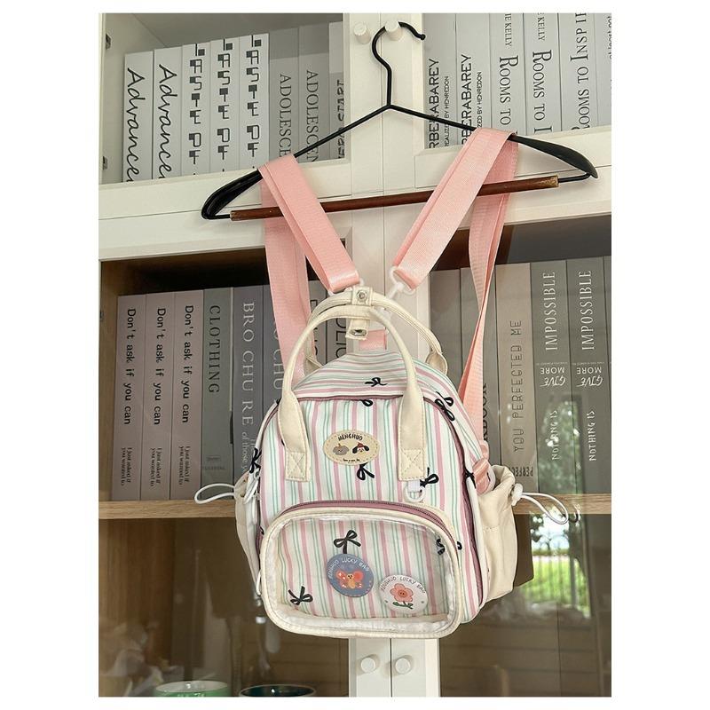 Новый школьный рюкзак - это высококачественный, свежий и милый клетчатый узор, ленивый и прозрачный, и мини-рюкзак для девочки.