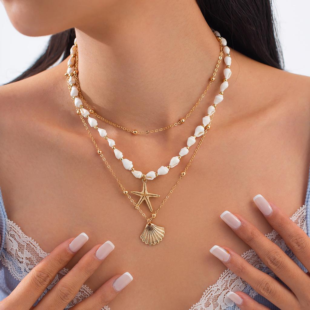 Модное простое ожерелье с подвеской в виде ракушки-звезды в праздничном стиле с жемчужными бусинами на ключицу, цепочка, сложенная в свежем сладком стиле для женщин