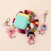 A lovely acrylic keychain with a lovely rupee