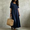 European and American cotton and linen dress women's summer new short-sleeved medium and long pleated loose casual solid color long dress
