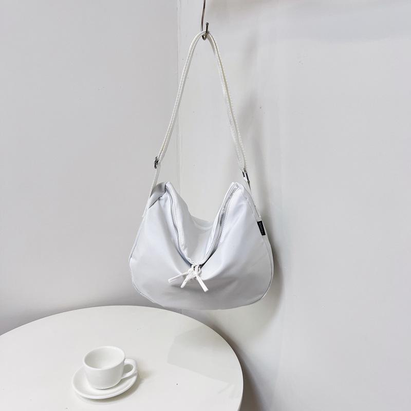 2025 Women's Large-Capacity Versatile Canvas Dumpling Bag: High-End Casual Commuter Tote