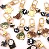 Spirited Away Cartoon Anime Figures Creative Metal Keychain No Face Man Cute Keyring Bag Pendant Charms Car Key Ring Accessories