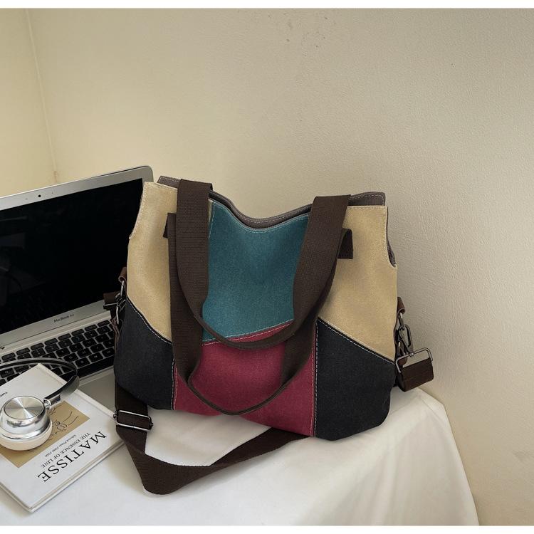 Canvas bag women's bag new Korean version of fashion leisure travel shoulder bag large capacity versatile women's portable messenger bag