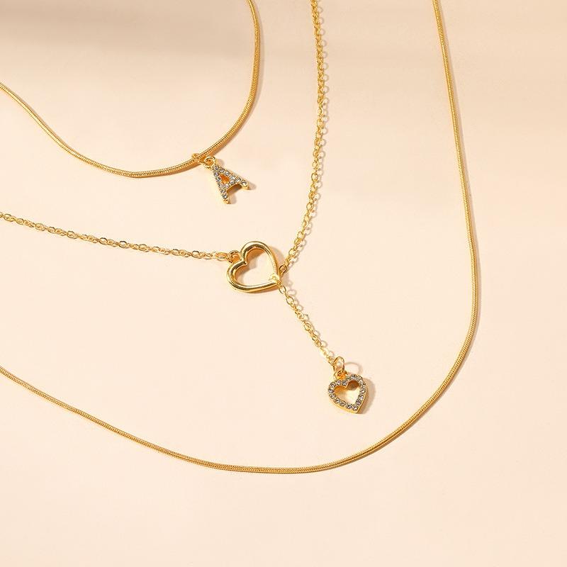 Ожерелье с буквой K из желтого золота, ювелирные изделия в стиле, универсальное, из сплава, с подвеской в виде сердца, трехслойное ожерелье с бахромой для женщин