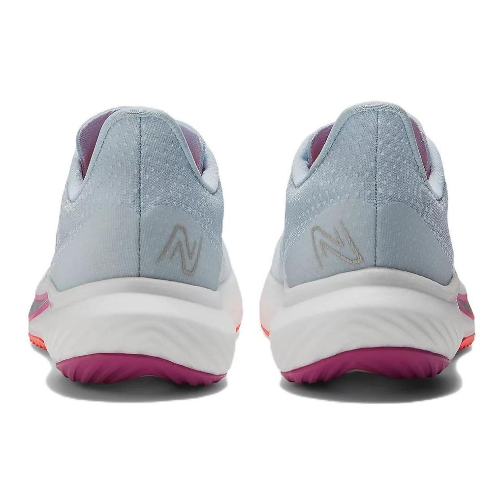 New Balance Женские кроссовки FuelCell Rebel v3 Starlight Magenta Pop Blue Electric-Red WFCXCS3