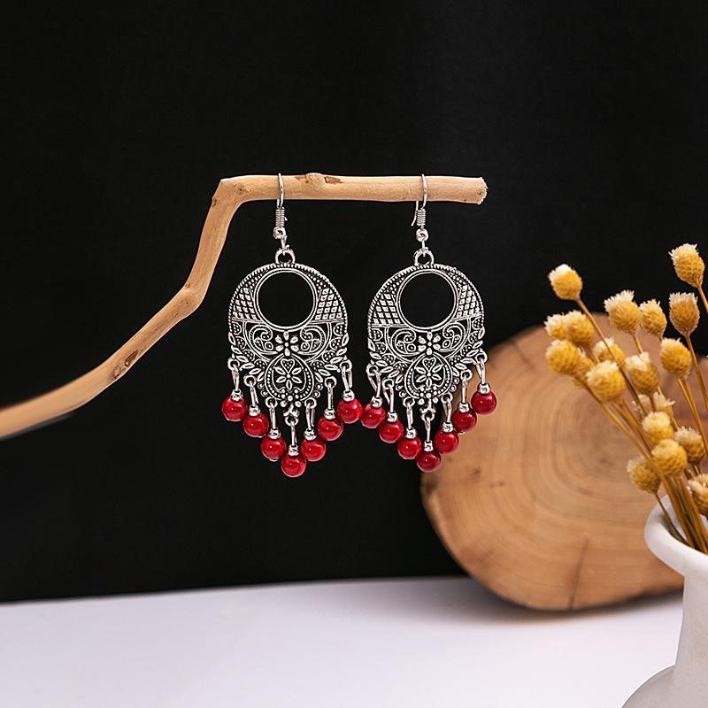 European and American Retro Hollow Turquoise Tassel Bohemian Earrings for Women