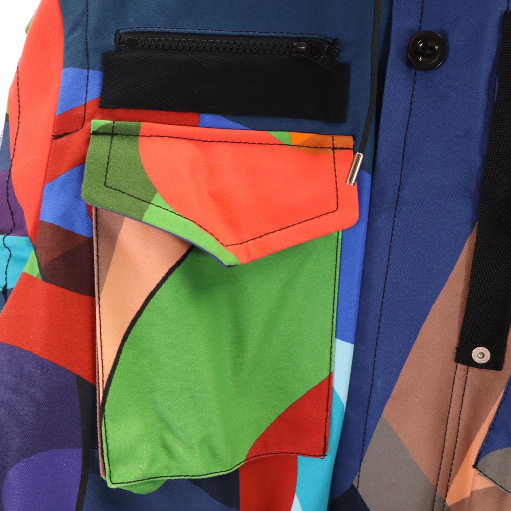 Неиспользованная Sacai 21AW KAWS коллаборация Горная парка 1 Куртка с вешалкой Мужская Б/У