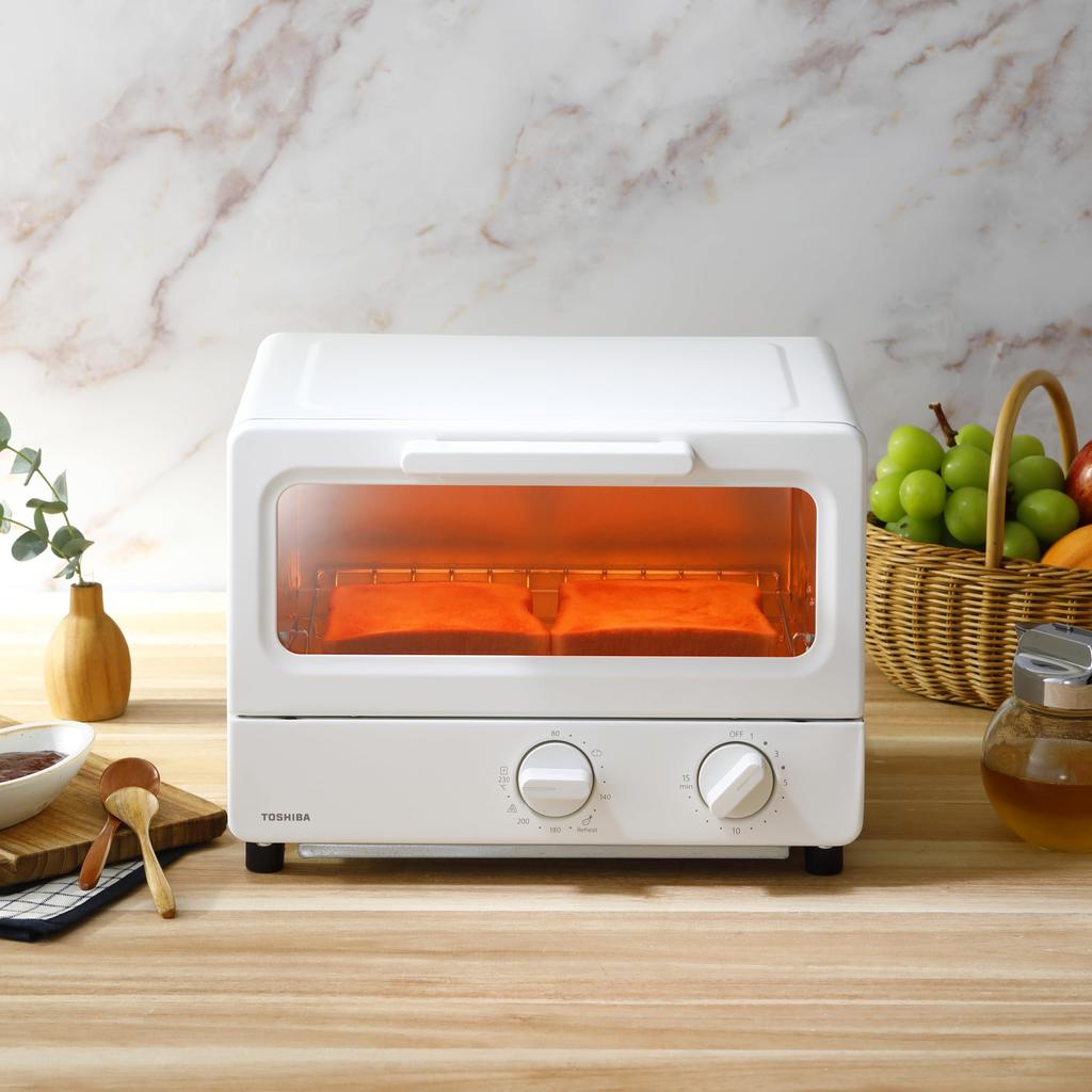 TOSHIBA Toaster Milky with temperature drip and HTR-PZ3(W) Oven, 2-slice capacity, White, control, tray, 15-minute timer.