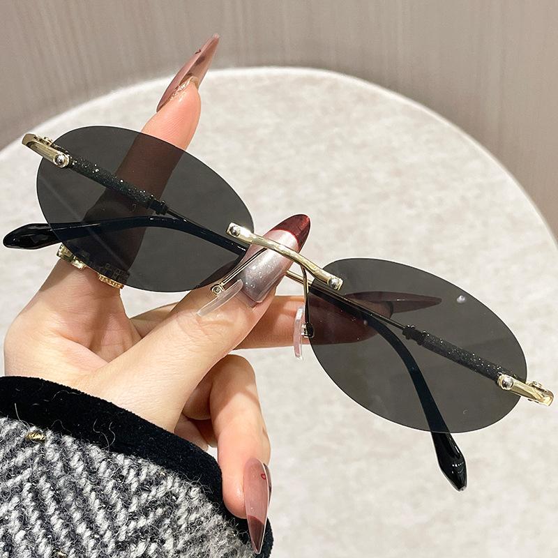 New Fashion Women'S Oval Metal Sunglasses Trendy Frameless Cut Edge Small Circular Eyeglasses Uv Protection Eyewear