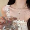 Elegant Double-Layer Tassel Pearl Necklace with Camellia Pendant for Women