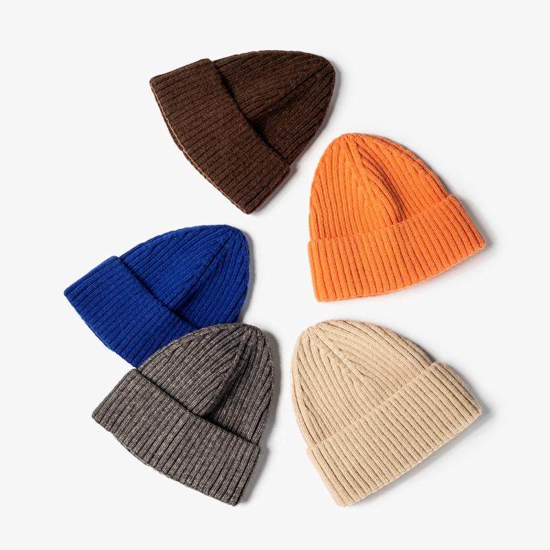 Fashion jacquard knitted hat women's autumn and winter outdoor warmth brimless pointed hat thickened ear protector wool hat tapered hat