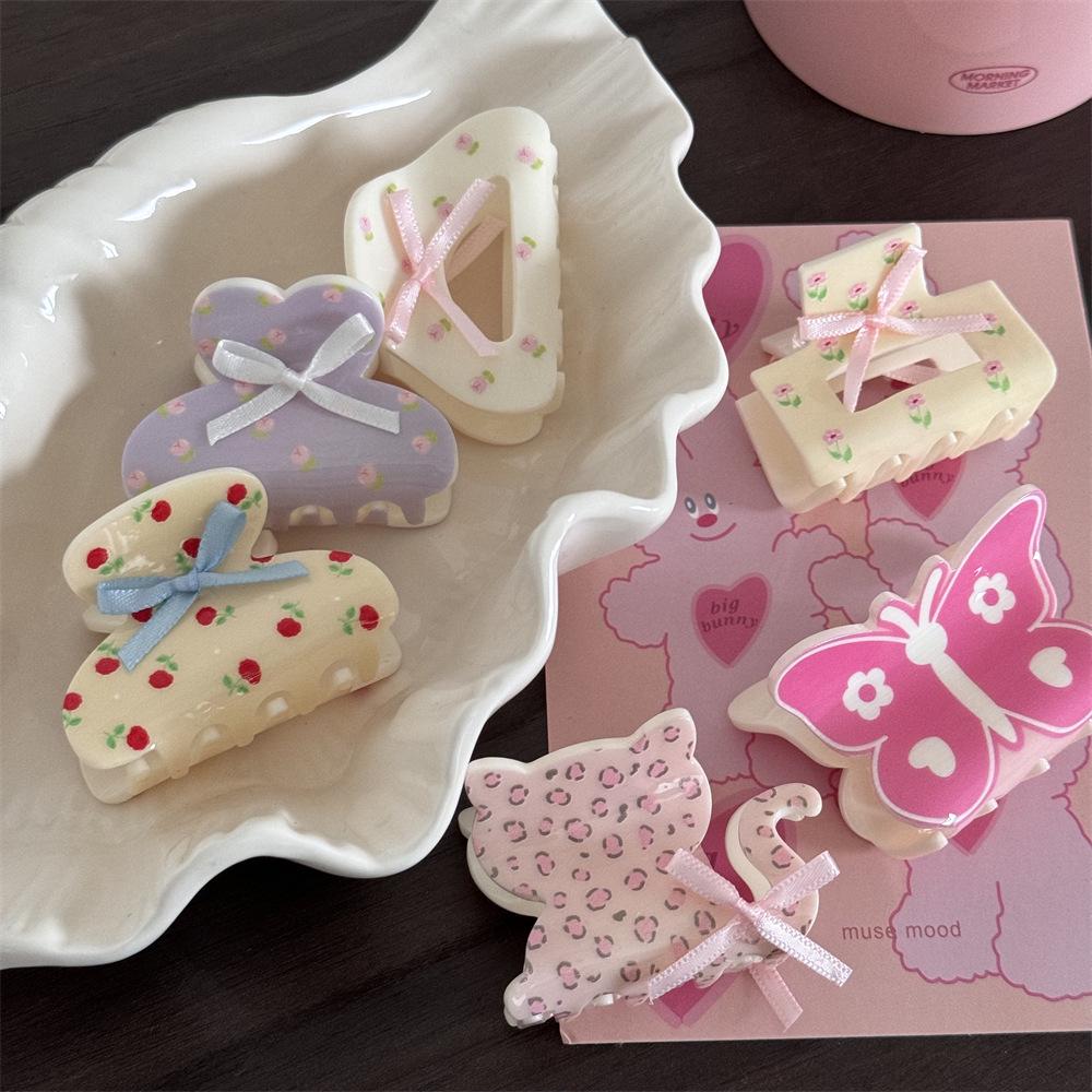Small Floral Bow Hair Clip for Fine Hair - Perfect for Half-Up Hairstyles with a Shark Clip Design.