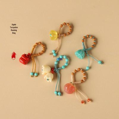 Подвеска из агата и бирюзы: Шарм «Коробочка семени лотоса и хурма» с бусинами Будды и бегунком-каплей.