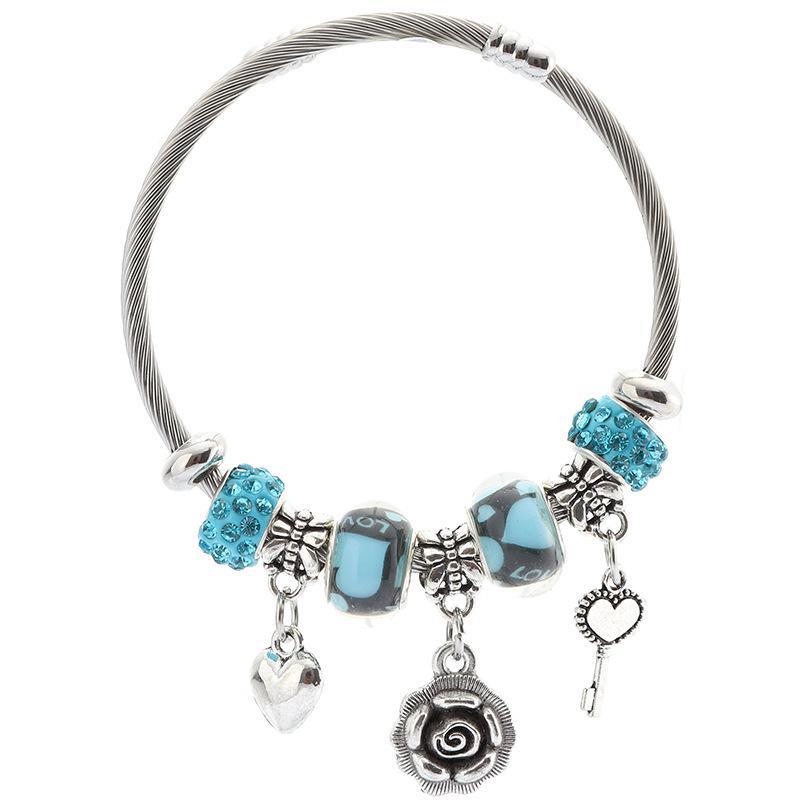 Стильный женский браслет из нержавеющей стали с шармами