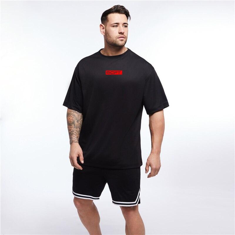Muscleguys Мужская спортивная одежда для фитнеса, свободная тренировочная футболка с короткими рукавами, летняя быстросохнущая одежда