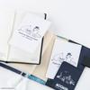 Ежедневник Hobonichi Moomin Techo с аксессуарами для промокательной бумаги.