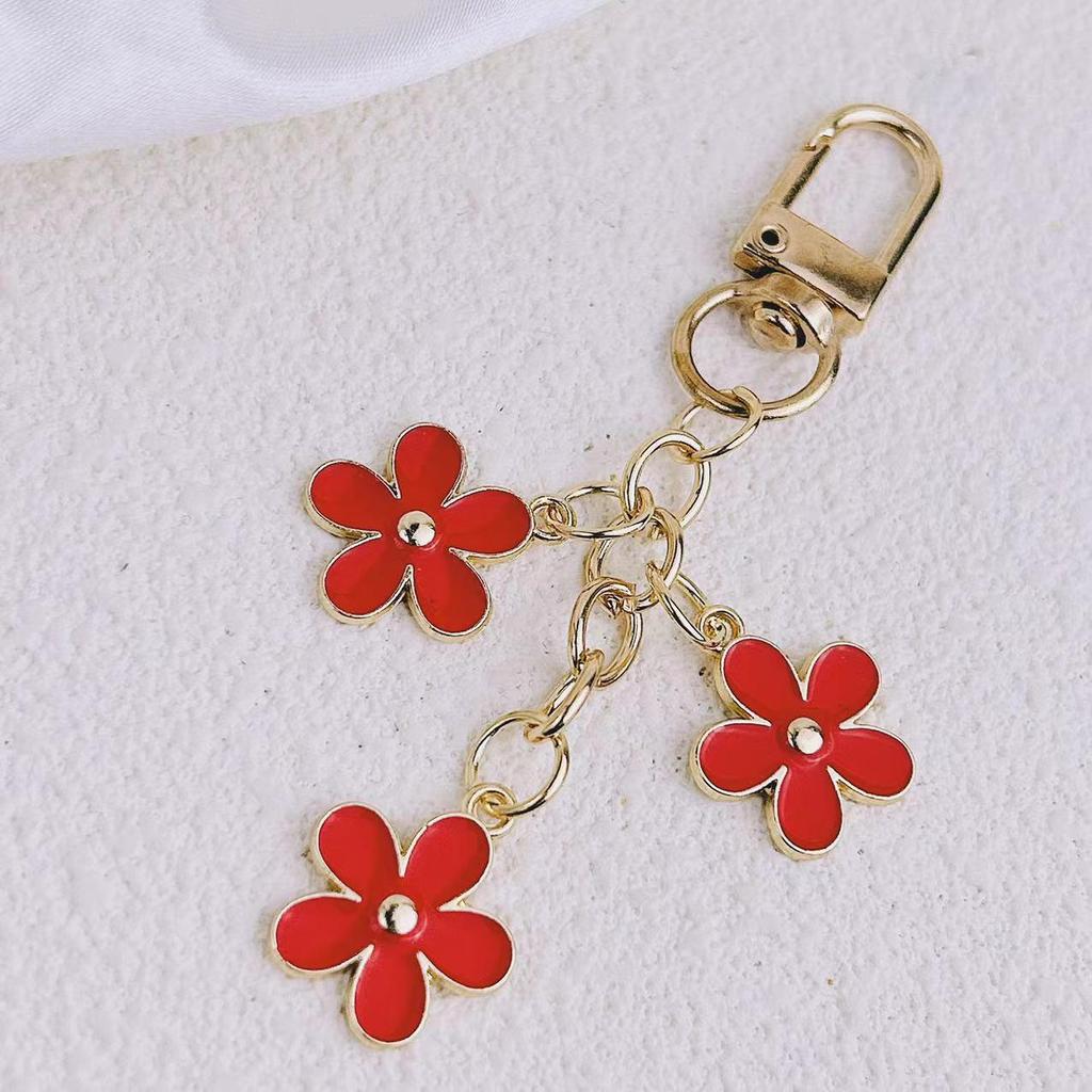 Европейский и американский летний брелок с цветком цвета капли масла для мобильных телефонов, сумок и автомобилей.