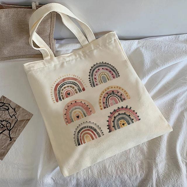 2022 Лето Новая женская дизайнерская сумка с мультяшным принтом Женская белая простая сумка через плечо Большой емкости Повседневная сумка Холст H