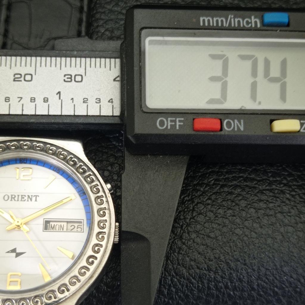 ВИНТАЖНЫЕ МУЖСКИЕ АВТОМАТИЧЕСКИЕ ЧАСЫ ORIENT ЯПОНИЯ С БЕЛЫМ ЦИФЕРБЛАТОМ a700155-5