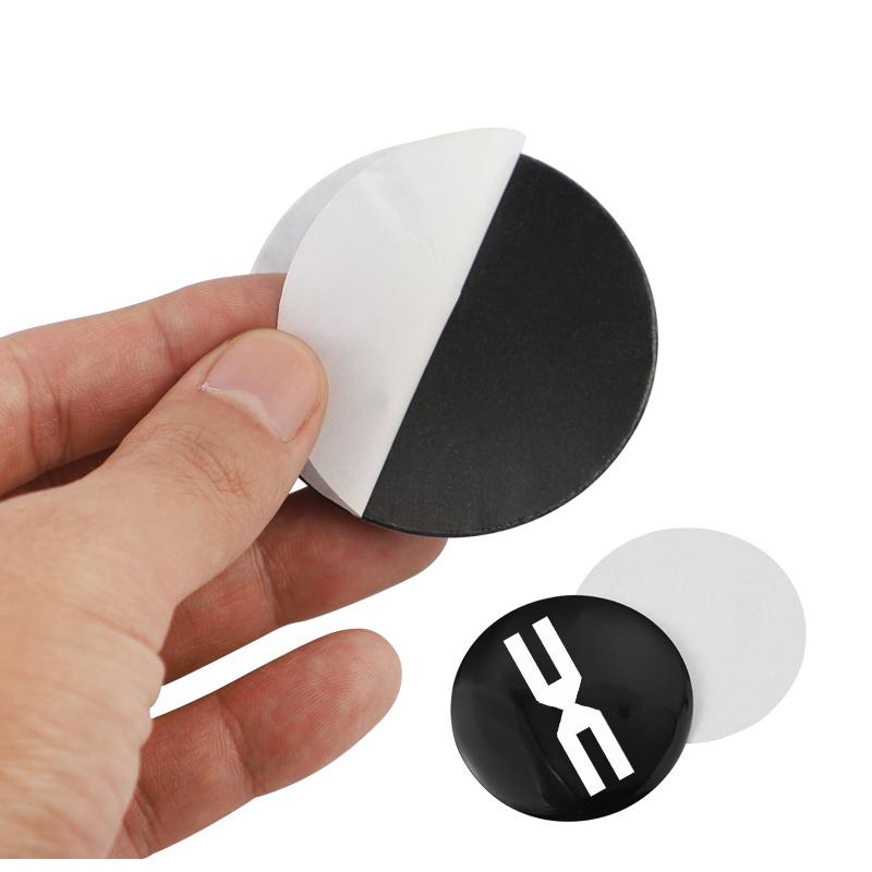 BGS1 4pcs Car Wheel Center Decorative Stickers Aluminum Alloy Badge Stickers For Dacia Bigster Spring Duster Sandero Jogger Dokker