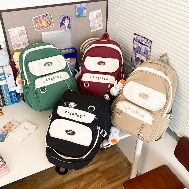 Korean version of simple primary school schoolbag female junior high school high school light leisure backpack outdoor travel large capacity backpack