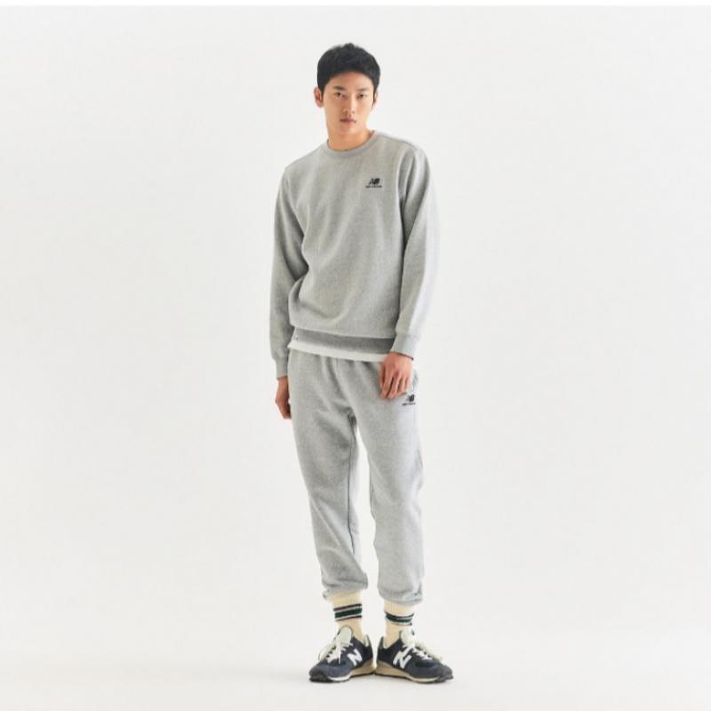 New Balance Брюки Kqj Nbmld41013 Ac Uni Essential Brushed Jogger Pants Stand