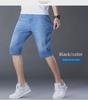 Popular Men's Cropped Four-Season Trousers: Elastic, Mid-Waist, and Trendy 7-Point Regular Denim for Youthful Style