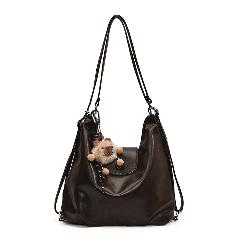 Сумка-тоут 2025 весна новая большая вместимость рюкзак для поездок на работу нишевый дизайн на плечо женская сумка многоцелевая сумка-мессенджер