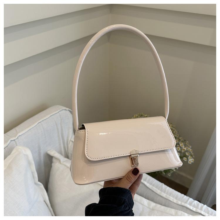 Французская нишевая фактурная сумка женская сумка 2024 летняя новая модная ретро сумка подмышкой глянцевая сумка через плечо в иностранном стиле