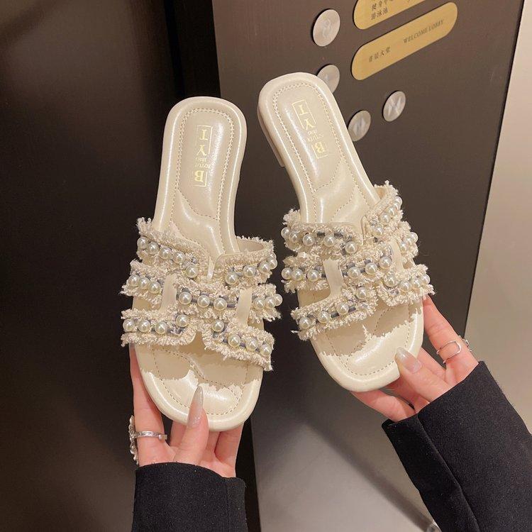 Прямые продажи с фабрики тапочки Xiaoxiangfeng женские летние модные 2025 новые летние на плоской подошве с перемычкой крутые тапочки ins тренд