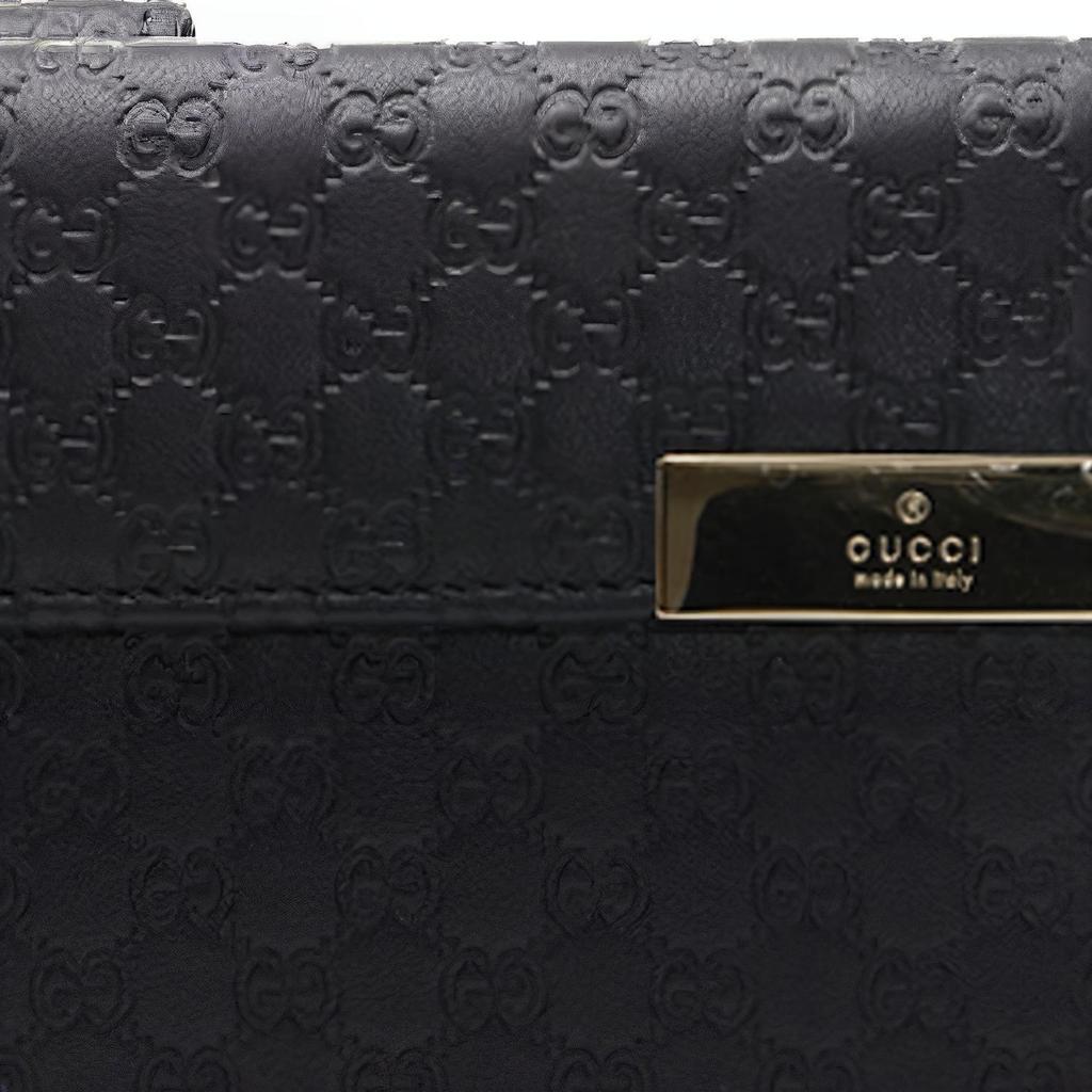 Gucci Длинный бифолд кошелек из тисненой кожи GG черного цвета для унисекс на каждый день